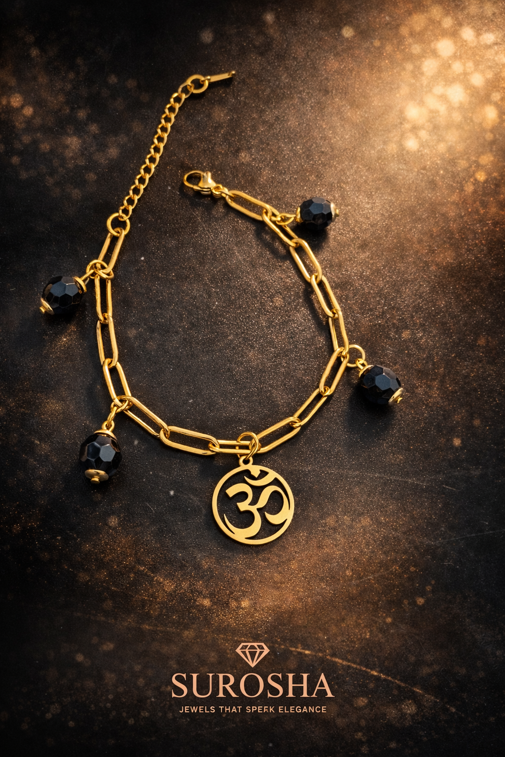 SuRosha Luxe Gouden Armband met Ohm Bedel & Zwarte Ogri Ai Kralen