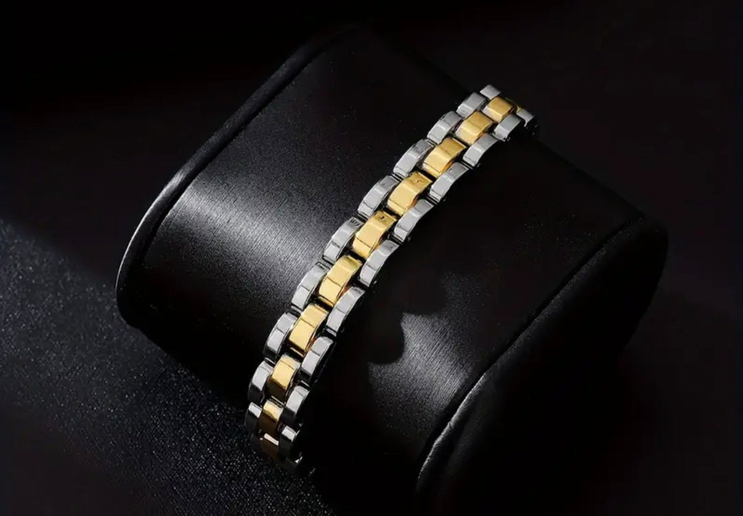 Herenarmband met goud- en zilverkleurige schakels