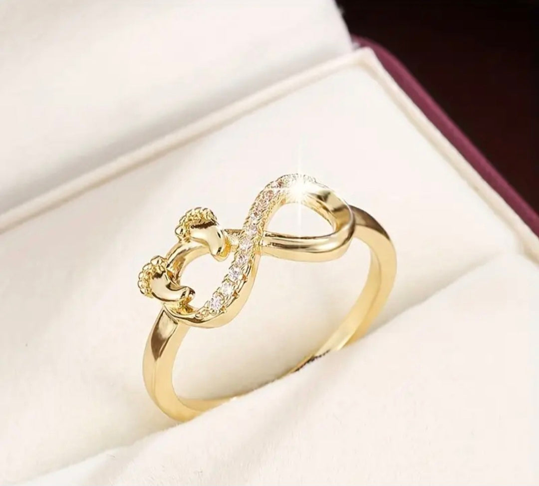 Infinity-ring met babyvoetjes en zirkonia