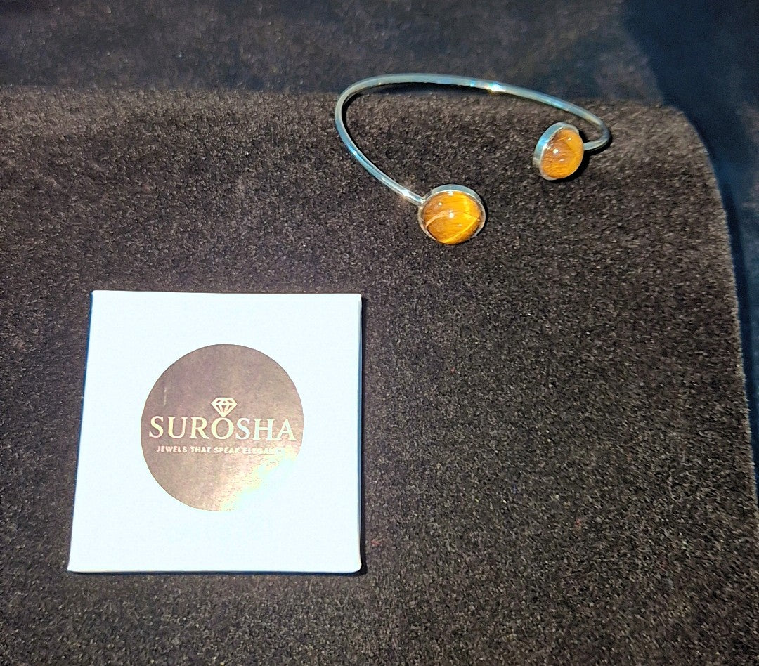 SuRosha zilverkleurige boei armband met tijgeroog