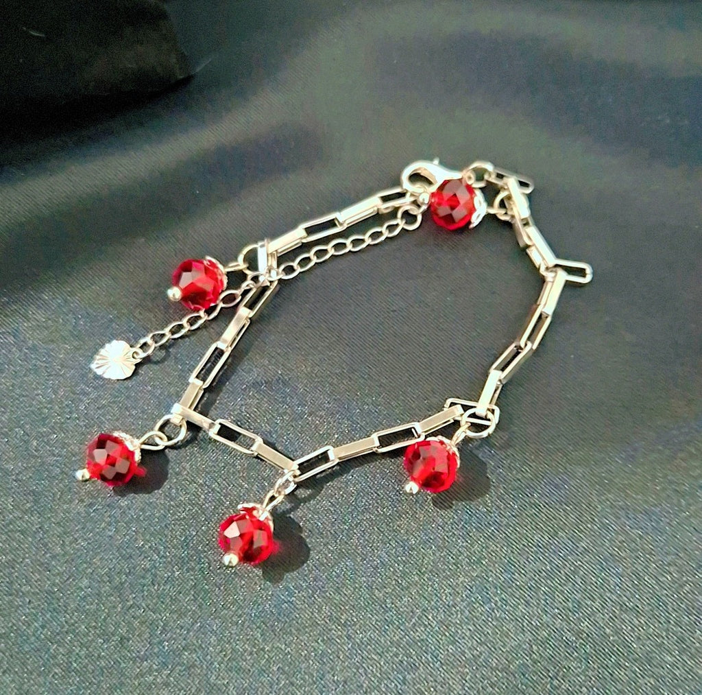 SuRosha zilverkleurige armband met Rode Ogri Ai kralen