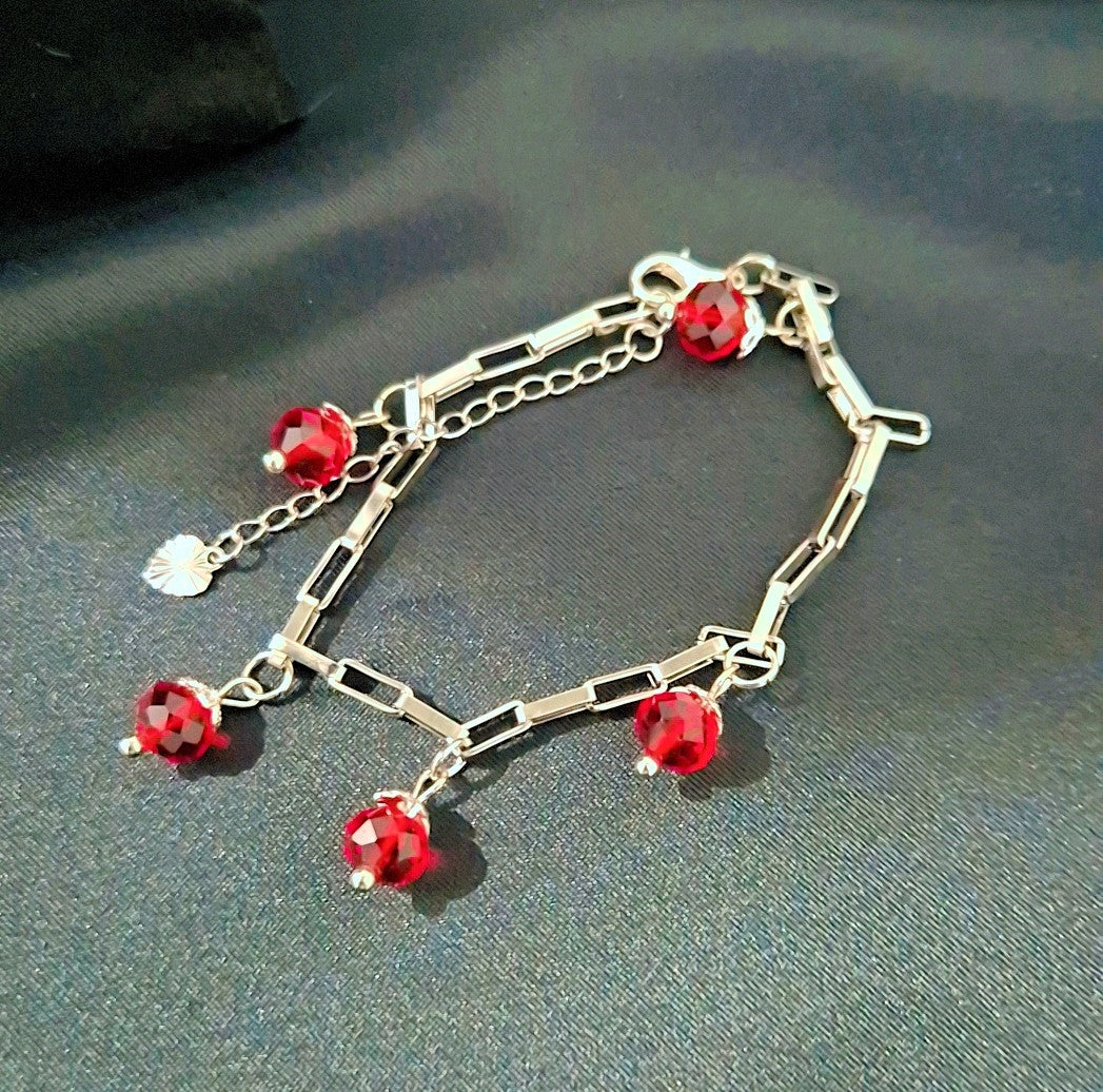 SuRosha zilverkleurige armband met Rode Ogri Ai kralen