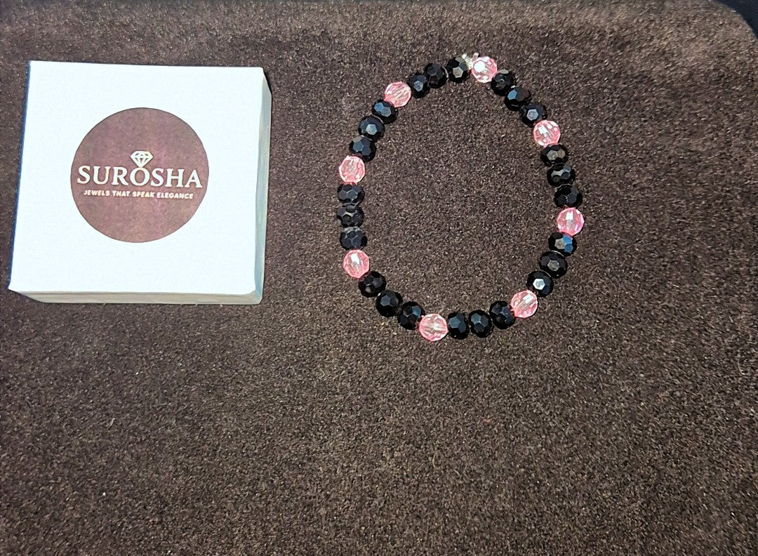 SuRosha armband met zwarte Ogri Ai kralen en roze Ogri Ai kralen