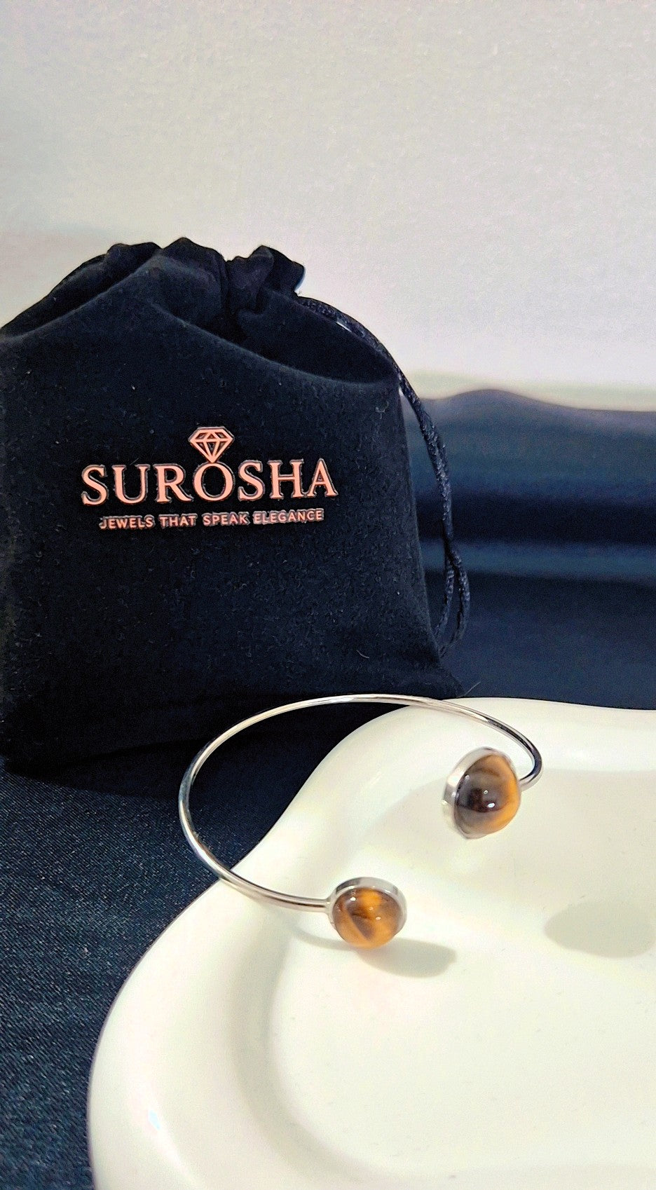 SuRosha zilverkleurige boei armband met tijgeroog