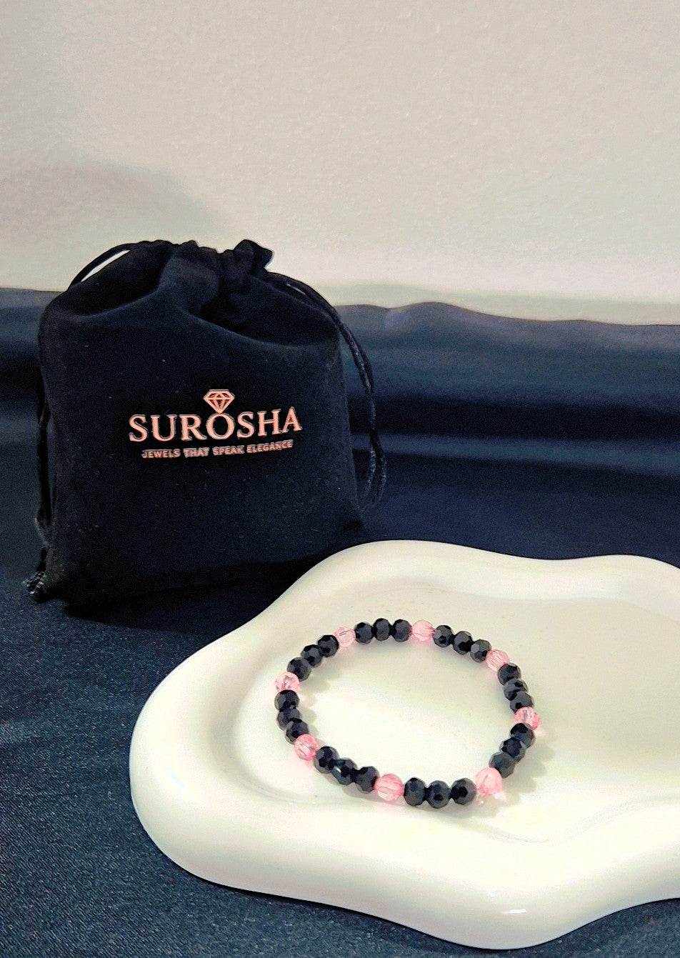 SuRosha armband met zwarte Ogri Ai kralen en roze Ogri Ai kralen