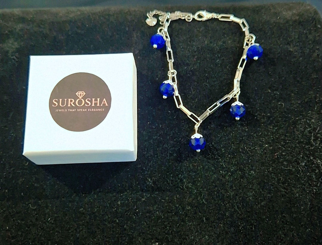 SuRosha zilverkleurige armband met blauwe Ogri Ai kralen